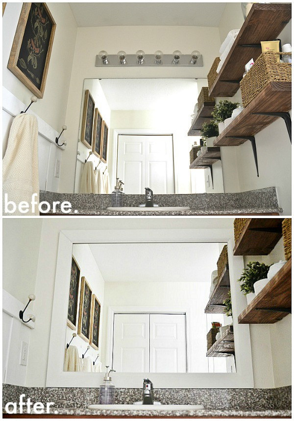 Framing your bathroom mirror will make it "sit" nicely with the rest of your decor.