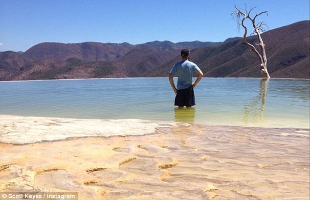 Wading into the waters of Hierve el agua in Oaxaca, Mexico, rock formations and the remnants of old geysers