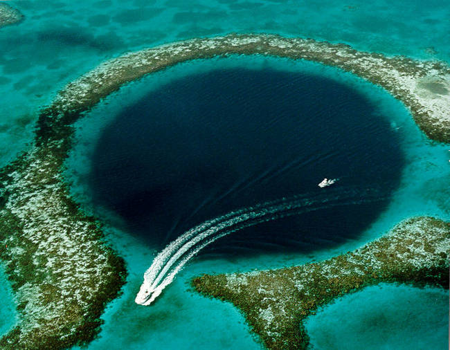 The Great Blue Hole, once a cave, was filled in as sea levels rose over the past hundred thousand years.