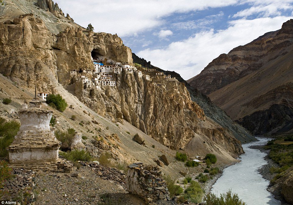 Giant honeycomb! The Phugtal Monastery in India is hidden on a cliff on the entrance to a cave in the Zanskar region