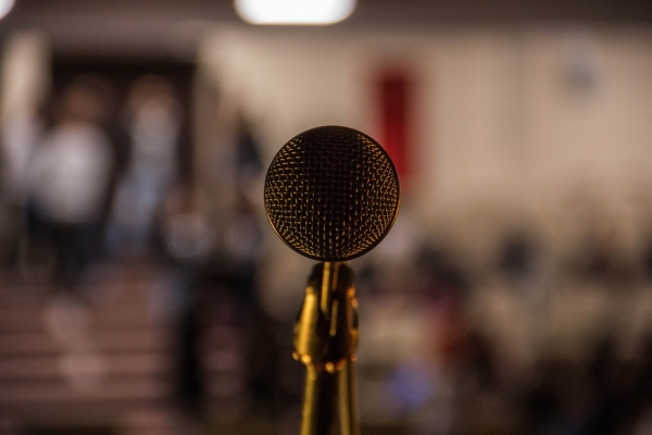 selective focus photography of pass-colored microphone