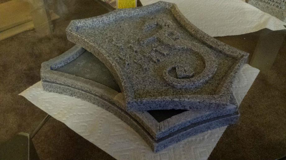 The tablets were designed to be hollow. The employees of the Wizards of the Coast are only human after all, so they are guaranteed to ignore the warnings on the outsides of the tablets. 

He placed his résumé in the center of each tablet, which he says weighed about the same as it would if it were made of actual stone.