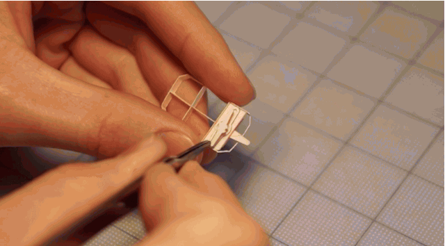 This meticulously crafted 777-replica is made of manila folders