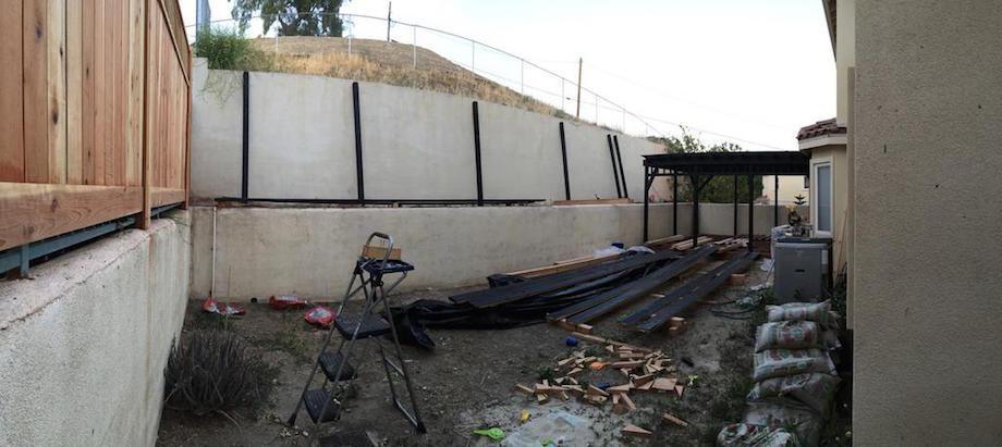 "I hated the empty garden area above and wanted to make a place for my girls to use their scooters but which also had shade and that I could grow some plants."