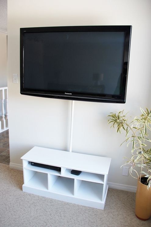 Hide your television wires in a shower curtain rod.