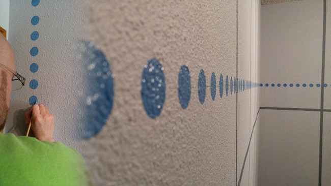 These circle details were painted by hand.