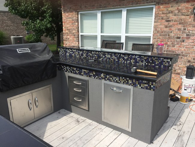 It was finally time to cover up those openings with some stainless steel doors.