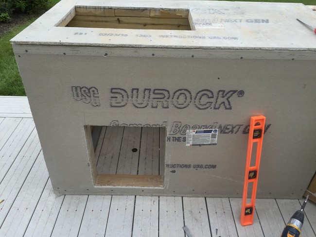 A hole was cut to make room for an ice chest.