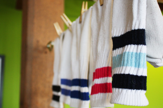 DIY a $5 indoor clothesline to skip the dryer damage.