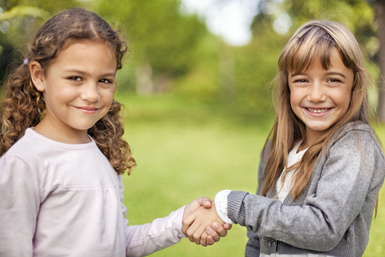 Getty_girls_shake_hands_greeting