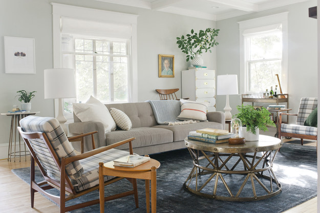 Living room rugs should be big enough for at least two legs of each furniture piece to be on it, if not all four.