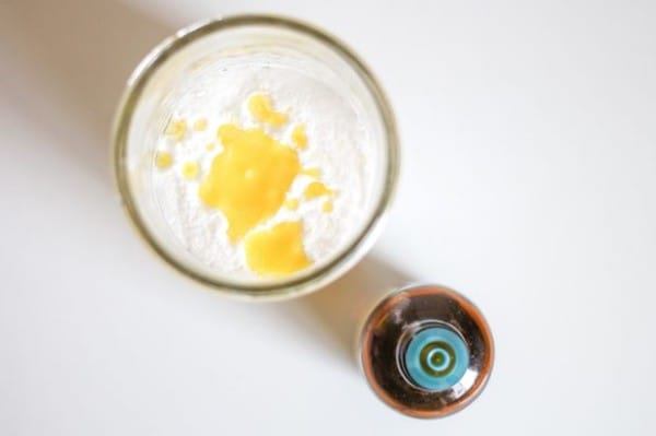 She then added the essential oils to the baking soda. Stronger essential oils, like rosemary or peppermint, only need 20 drops — whereas lavender or citrus could use 30 drops. 